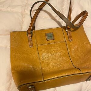 Dooney & Bourke Tan (50’s) golden Leather Tote w Red lining pre loved